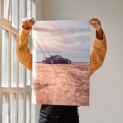 Nissan 350z poster showing a sleek car on desert terrain with soft sky, automotive wall art.