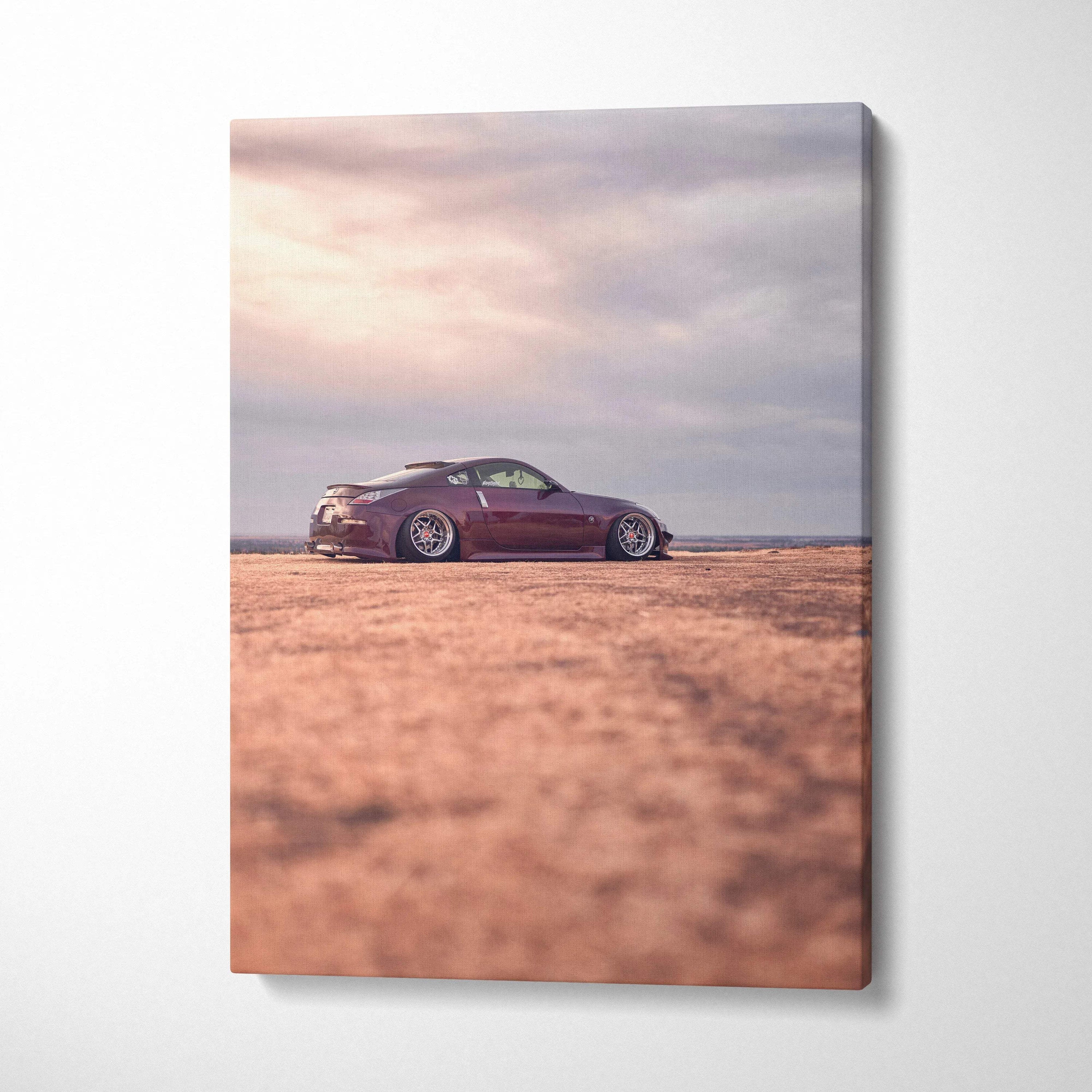 Red Nissan 350z sports car on desert landscape canvas wall art, vertical high-resolution print.