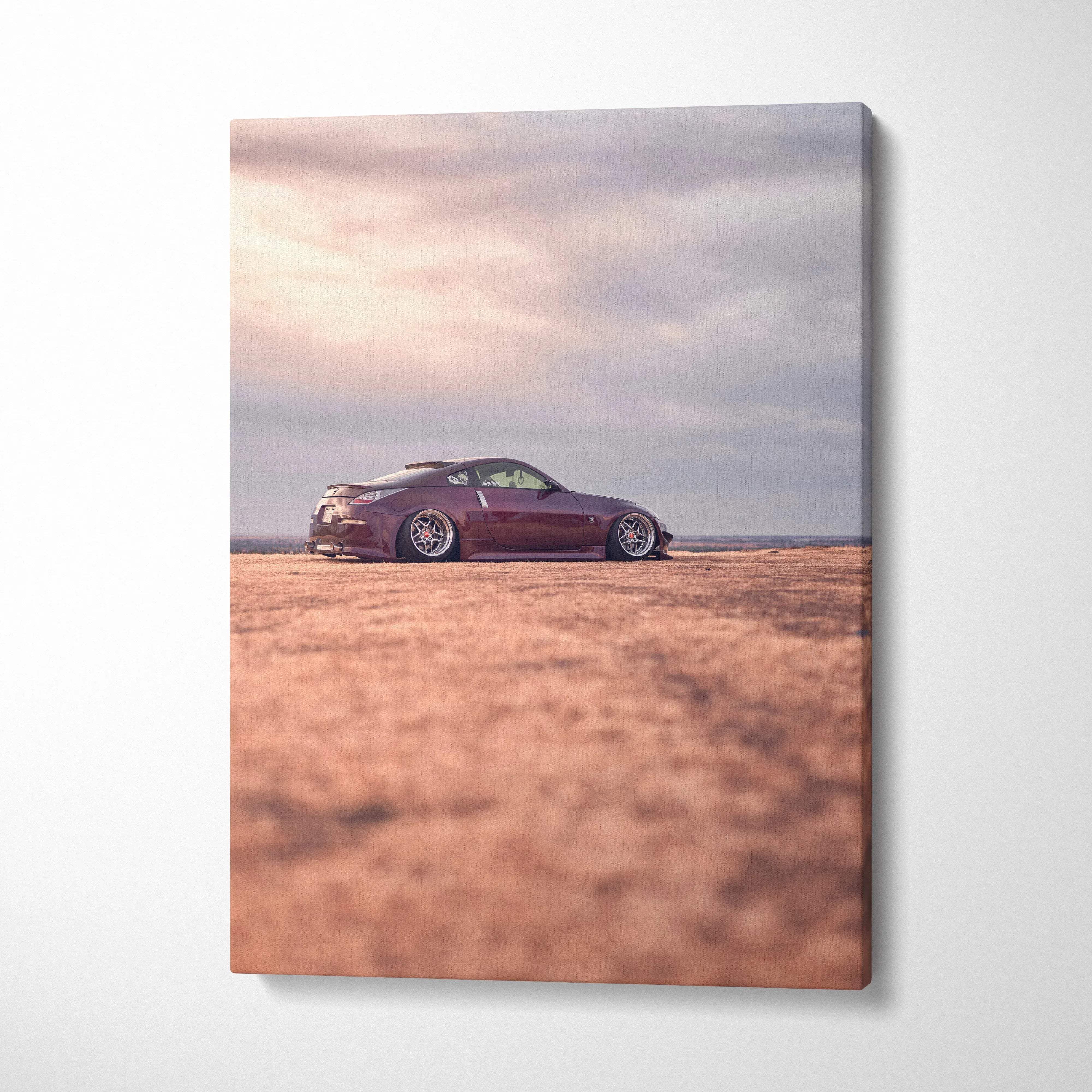 Red Nissan 350z sports car on desert landscape canvas wall art, vertical high-resolution print.
