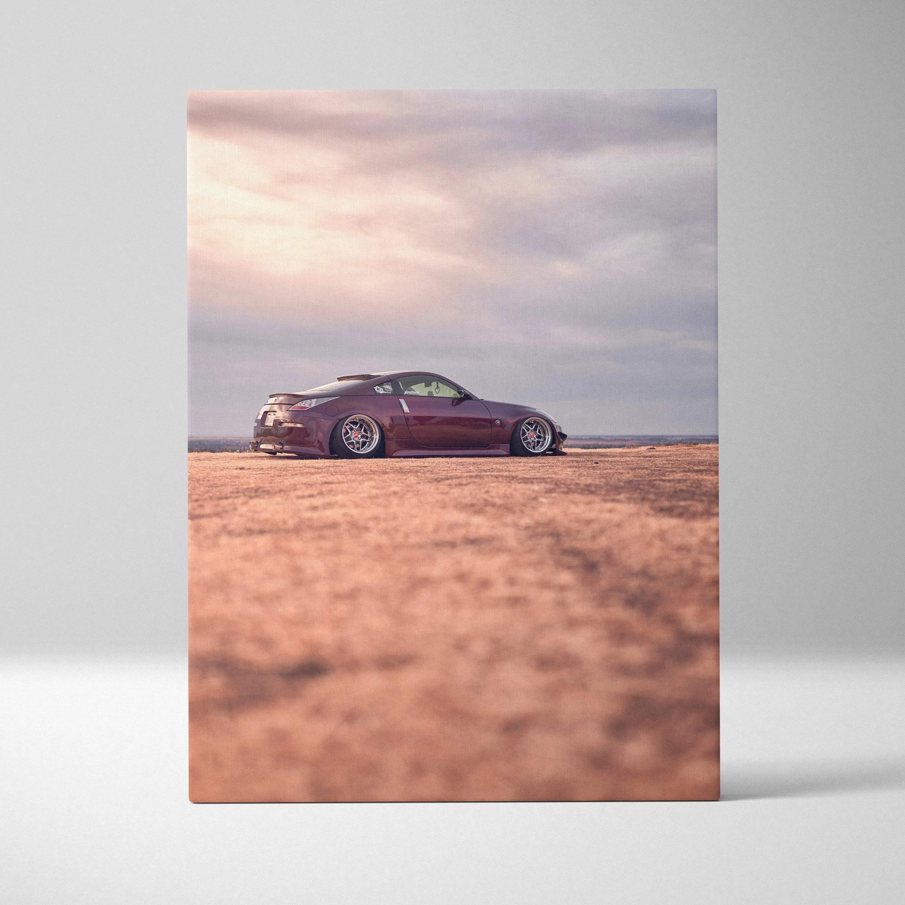 Nissan 350z sports car on desert landscape canvas wall art in vertical format.
