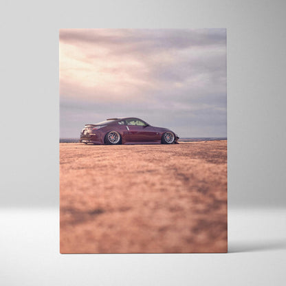 Nissan 350z sports car on desert landscape canvas wall art in vertical format.