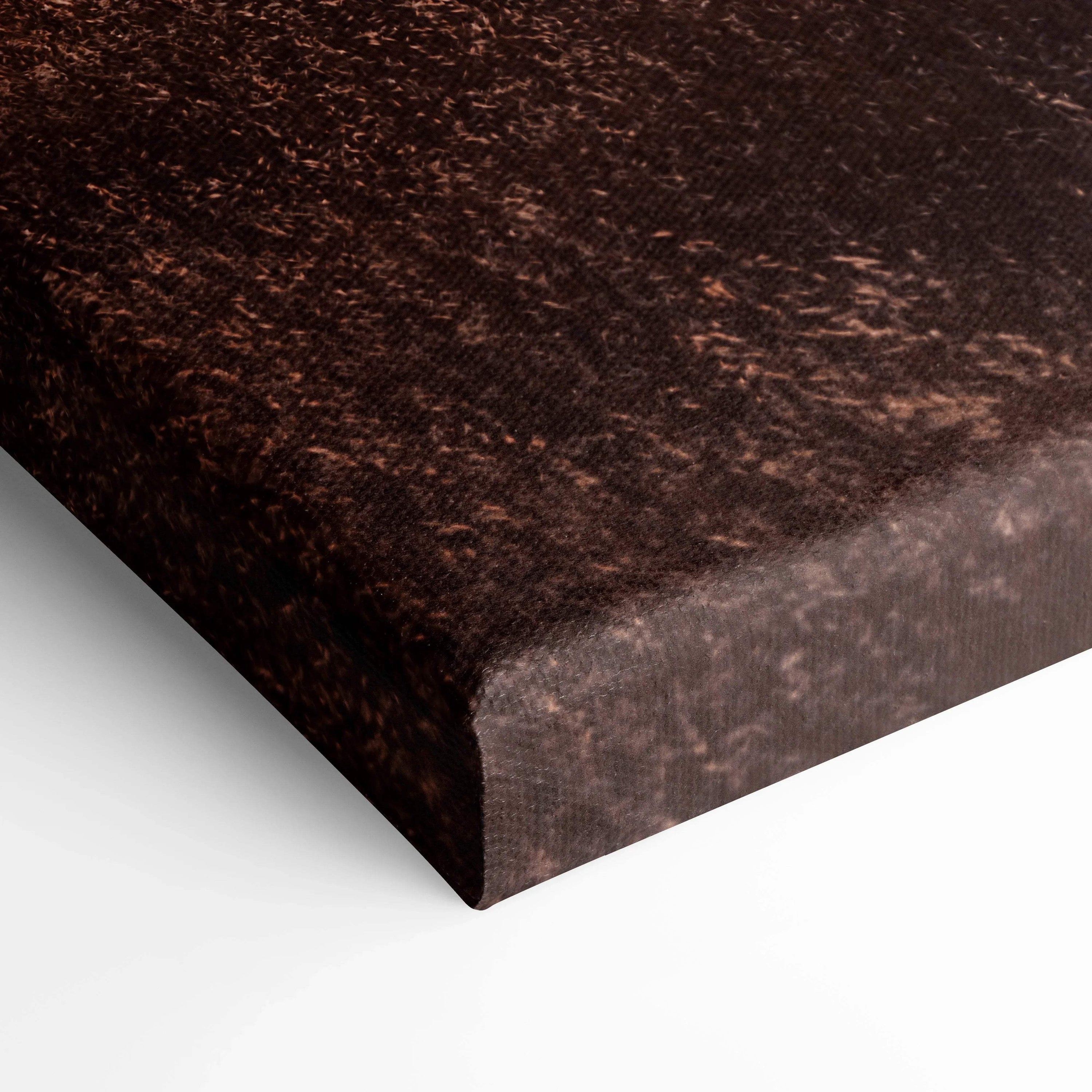 Close-up of textured dark brown canvas edge on vertical wall art print.