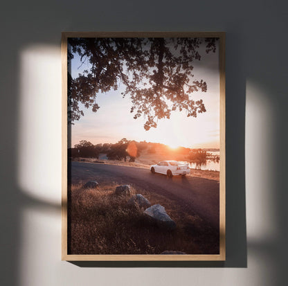 Nissan Skyline R33 GTS-T poster wall art showcasing sunset drive with warm tones and scenic landscape.