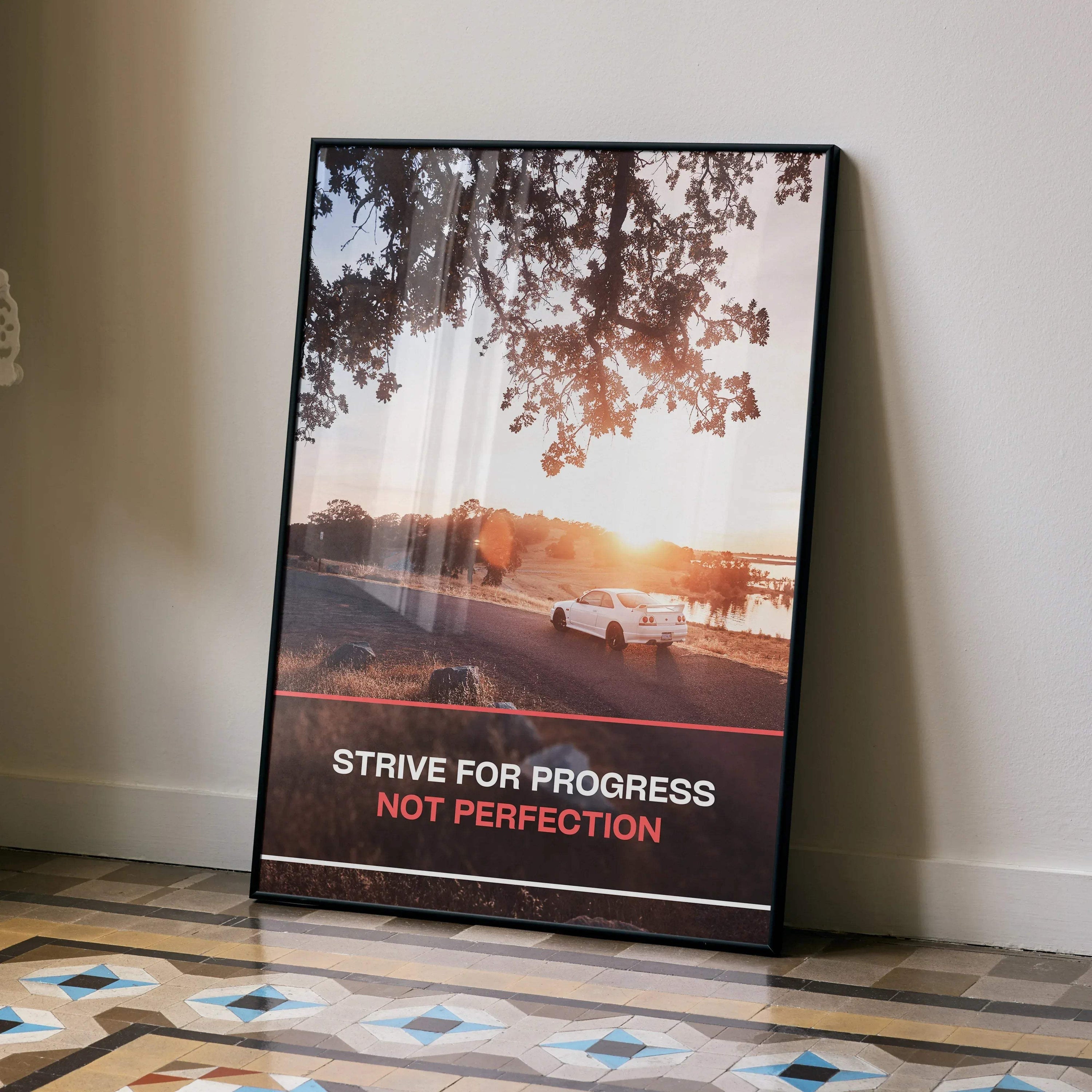 Motivational poster wall art featuring a Nissan R33 Skyline GTS-T at sunset with inspiring text.