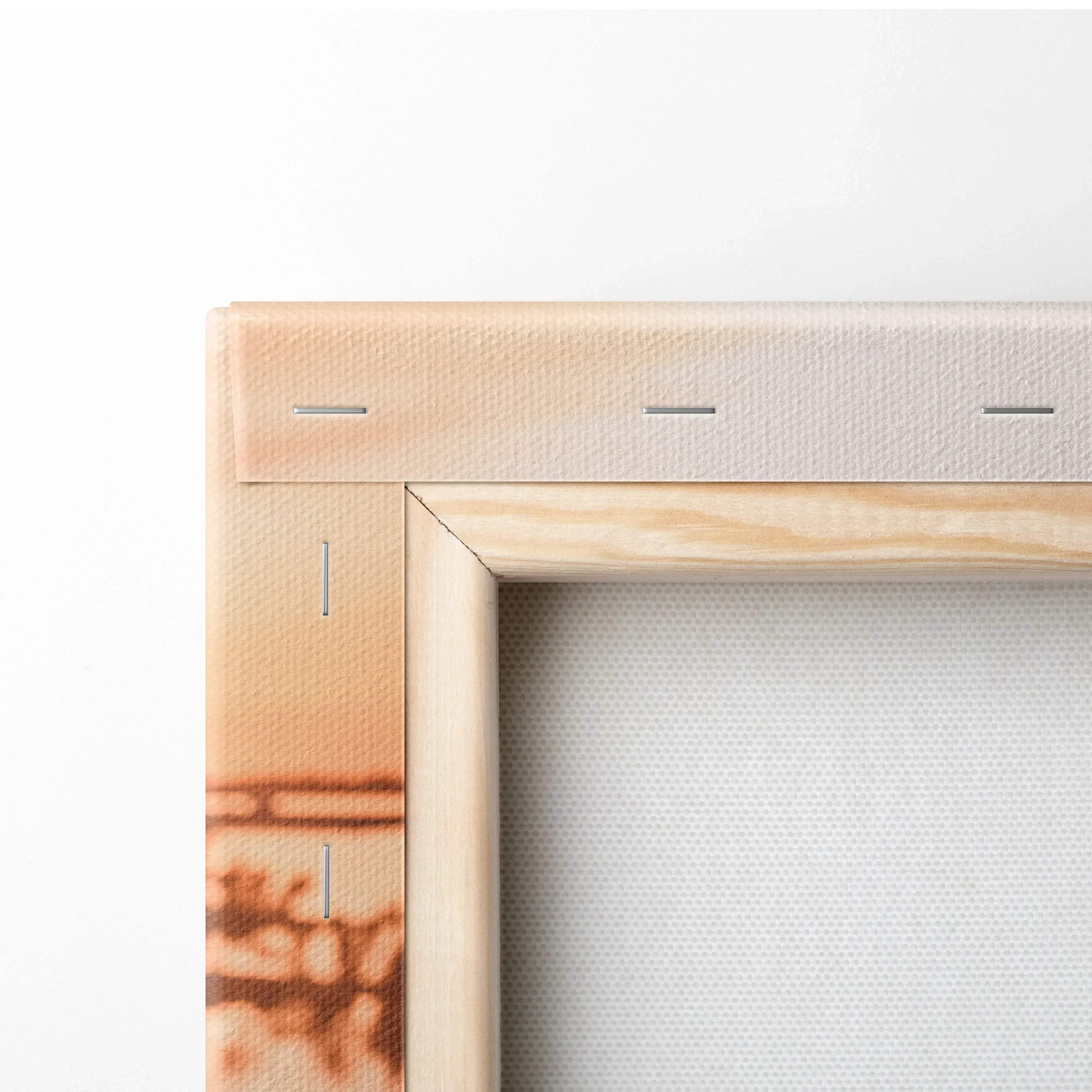 Close-up of Nissan R33 GTS-T canvas wall art corner with wooden frame and orange sunset tones.