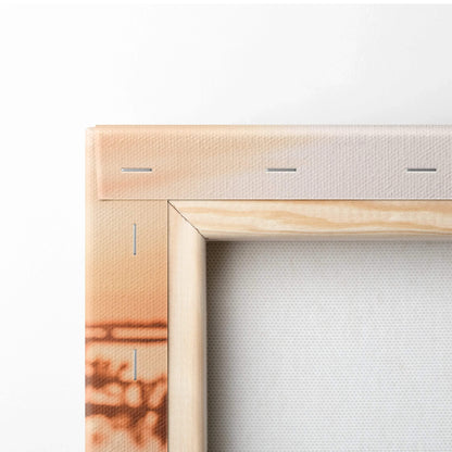 Close-up of Nissan R33 GTS-T canvas wall art corner with wooden frame and orange sunset tones.