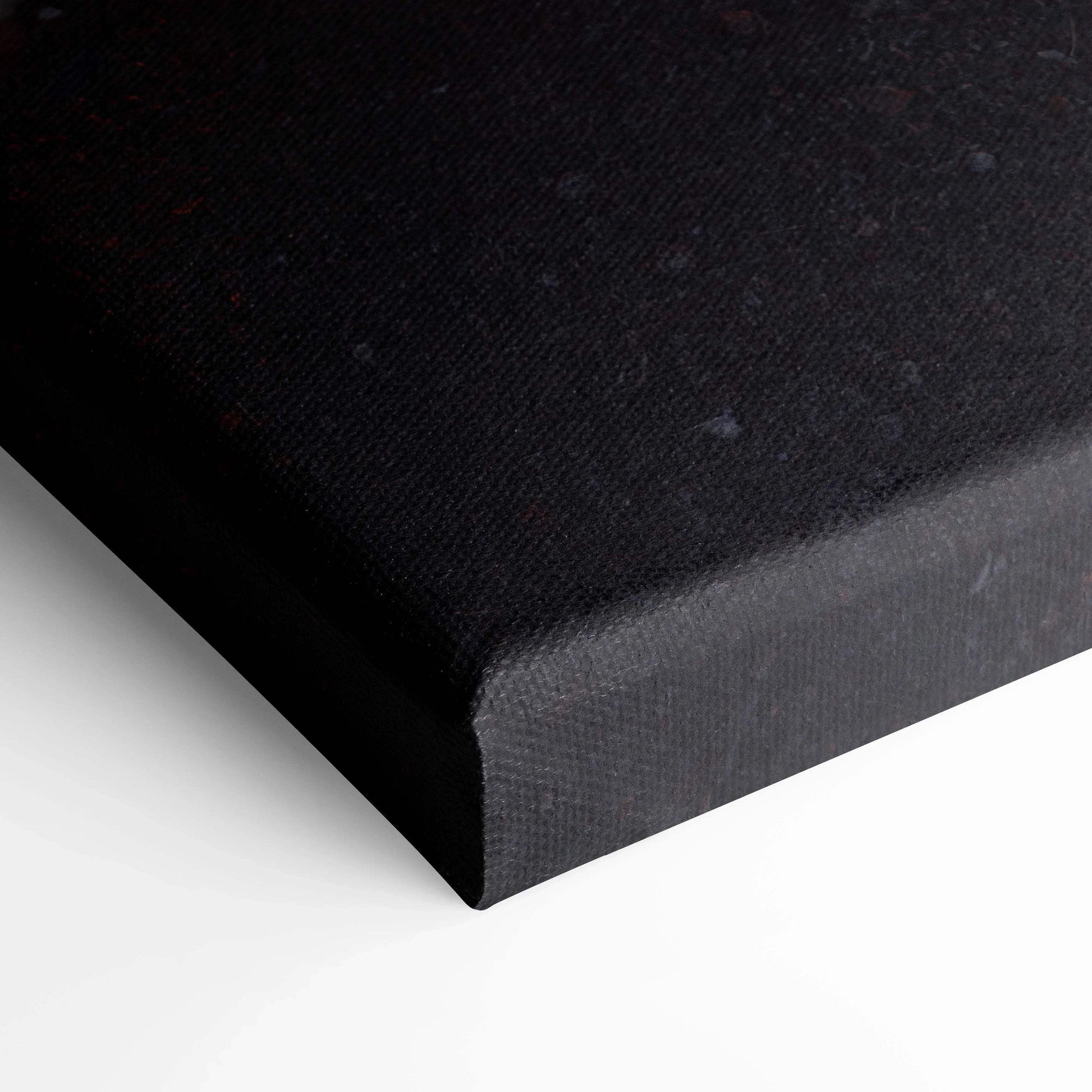 Close-up of black wrapped canvas corner for vertical wall art print.