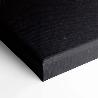Close-up of black wrapped canvas corner for vertical wall art print.
