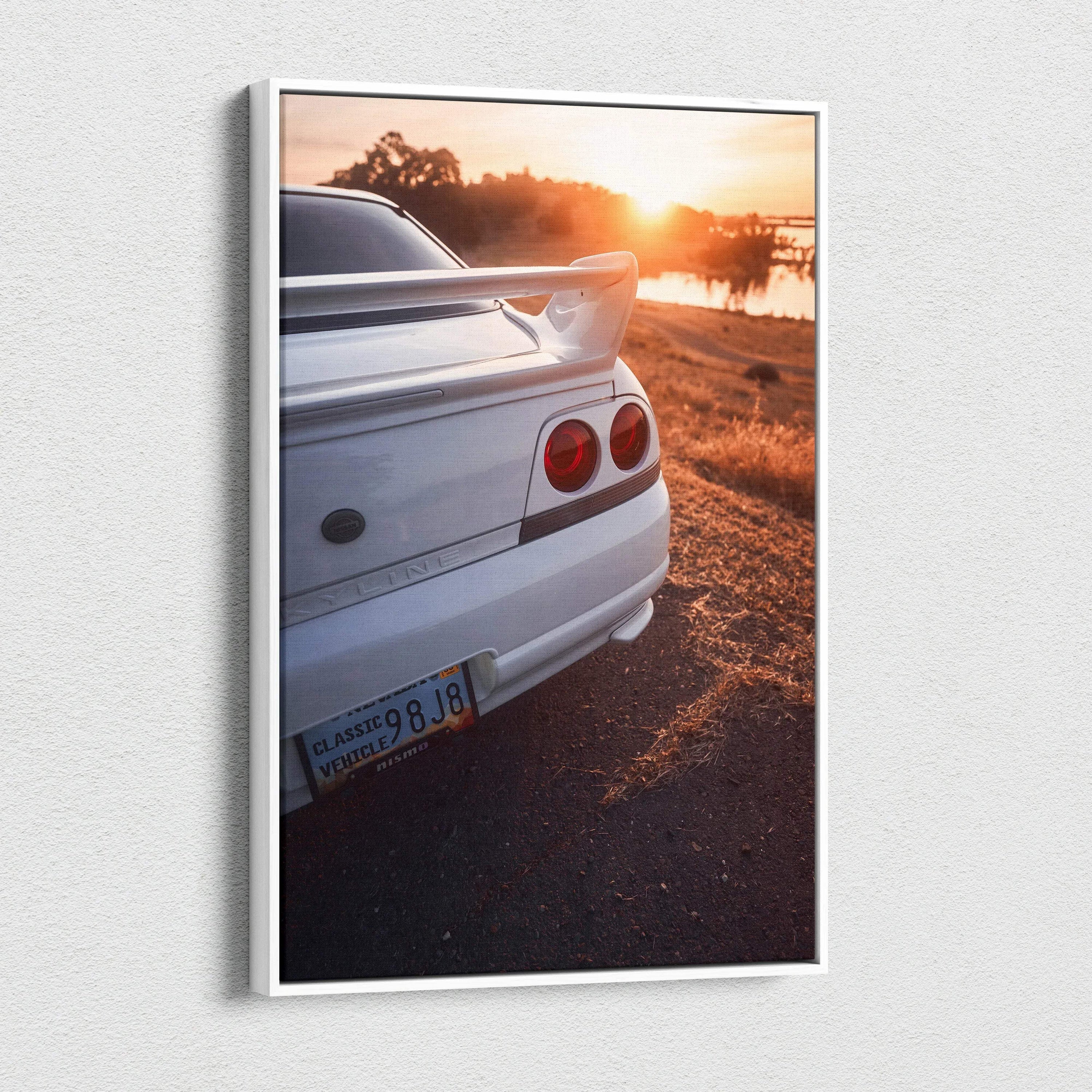 Vertical canvas wall art of white Nissan R33 GTS-T rear at sunset with warm orange sky.