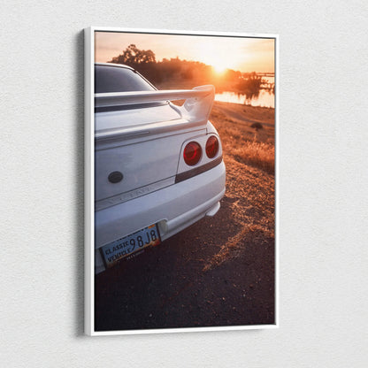 Vertical canvas wall art of white Nissan R33 GTS-T rear at sunset with warm orange sky.