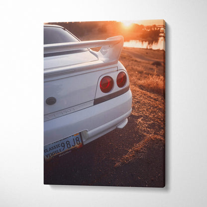 White Nissan R33 GTS-T rear view with sunset background canvas wall art.