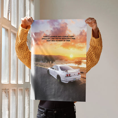 Motivational poster wall art featuring white Nissan R33 Skyline GTS-T on sunset road with inspiring quote.