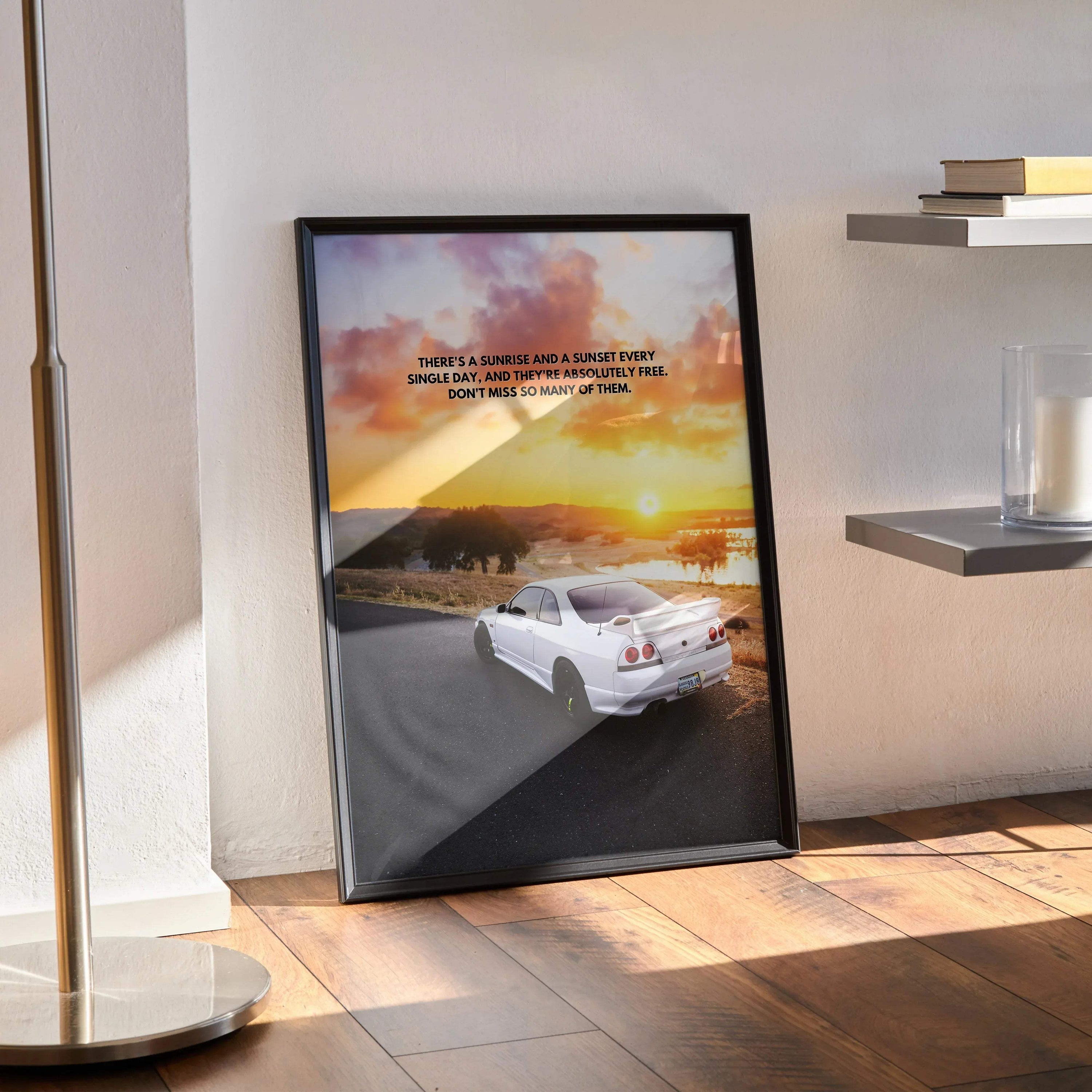 Motivational poster wall art featuring white Nissan R33 Skyline GTS-T driving at sunset on winding road.