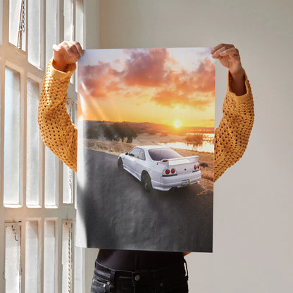 Nissan Skyline R33 GTS-T poster featuring white car on a coastal road at sunset wall art.