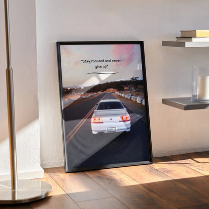 Motivational poster wall art featuring a white Nissan R33 Skyline GTS-T on a highway at sunset with inspiring text.