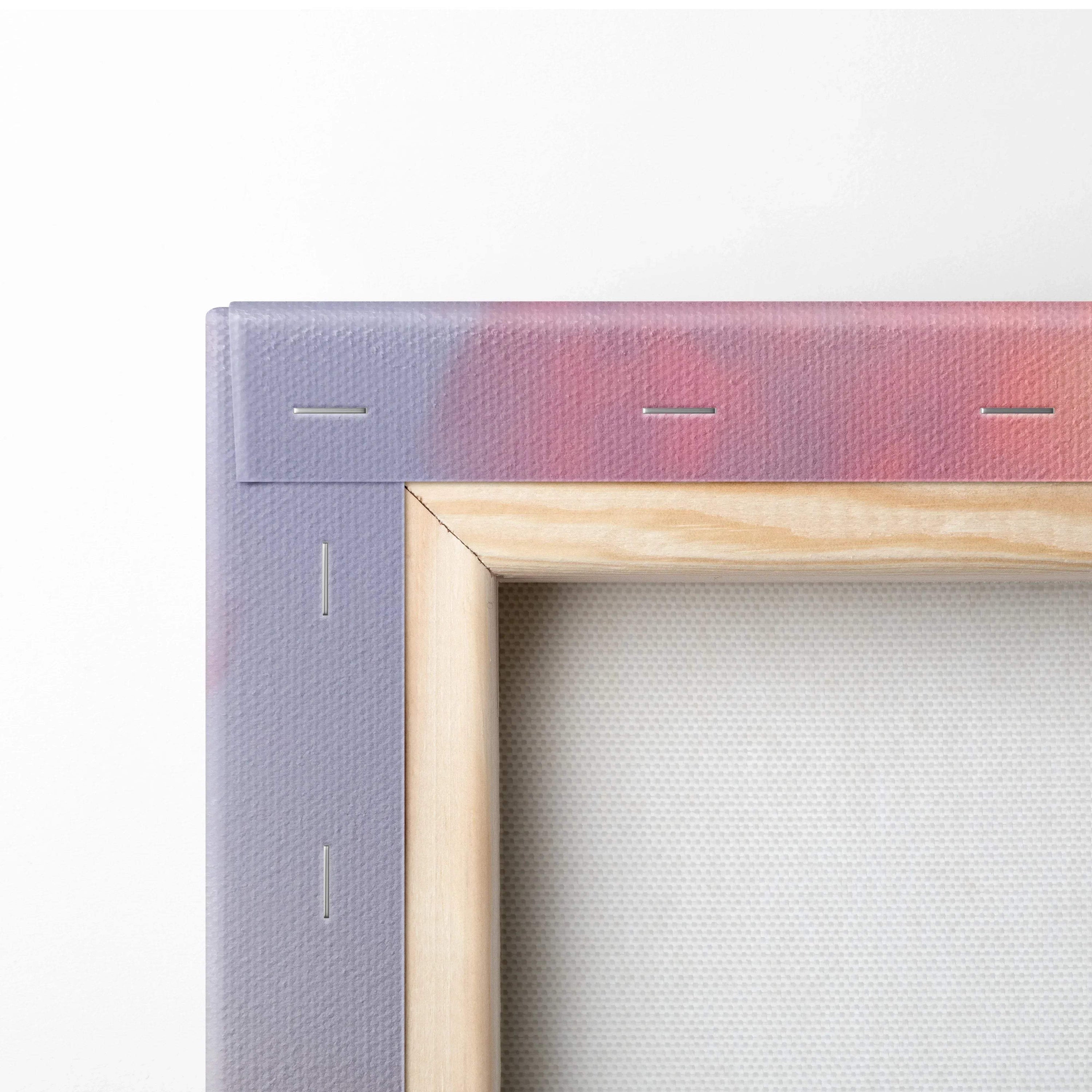 Close-up of wooden stretcher bars and edge of high-resolution canvas wall art with purple and red gradient background.