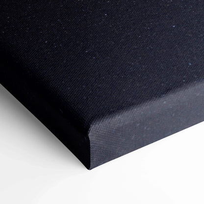 Black wrapped canvas corner with textured fabric and clean edges for wall art display.