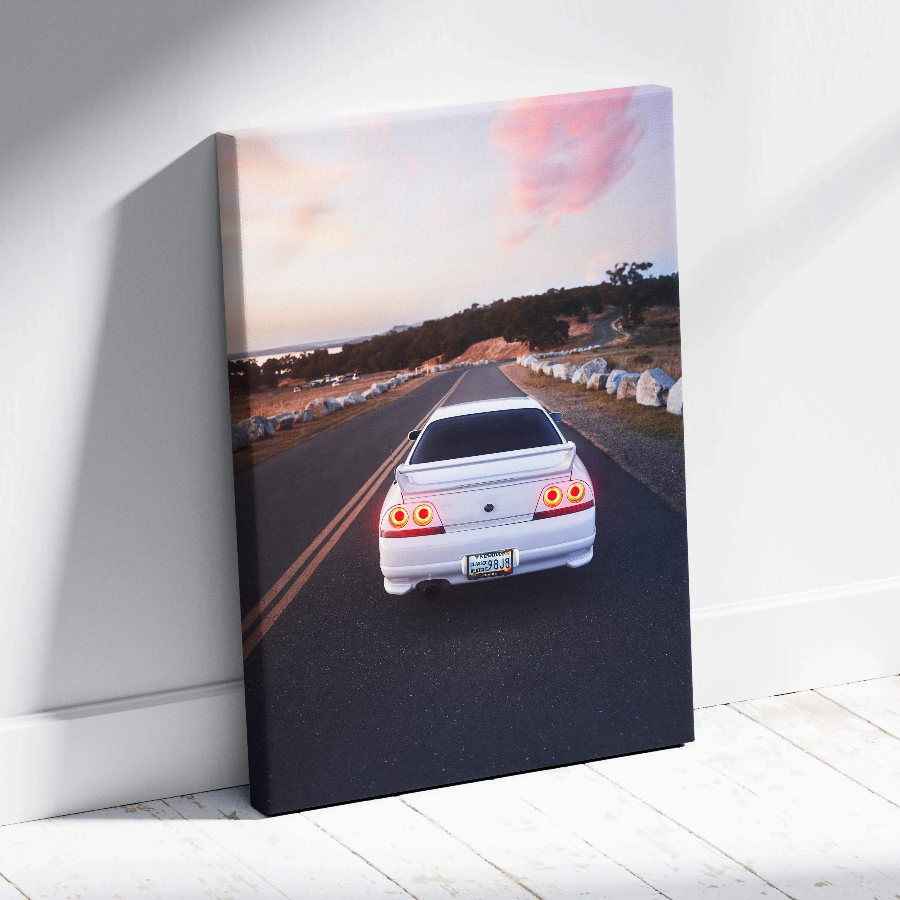 White Nissan R33 GTS-T on road at sunset canvas wall art print.