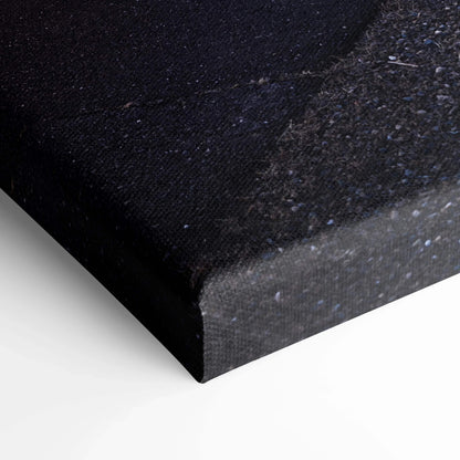 Close-up of black textured canvas corner showing high-quality wall art print edge.