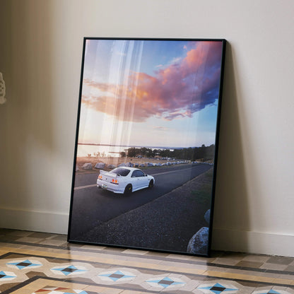 Nissan R33 GTS-T parked by a roadside under a colorful sunset sky poster wall art.