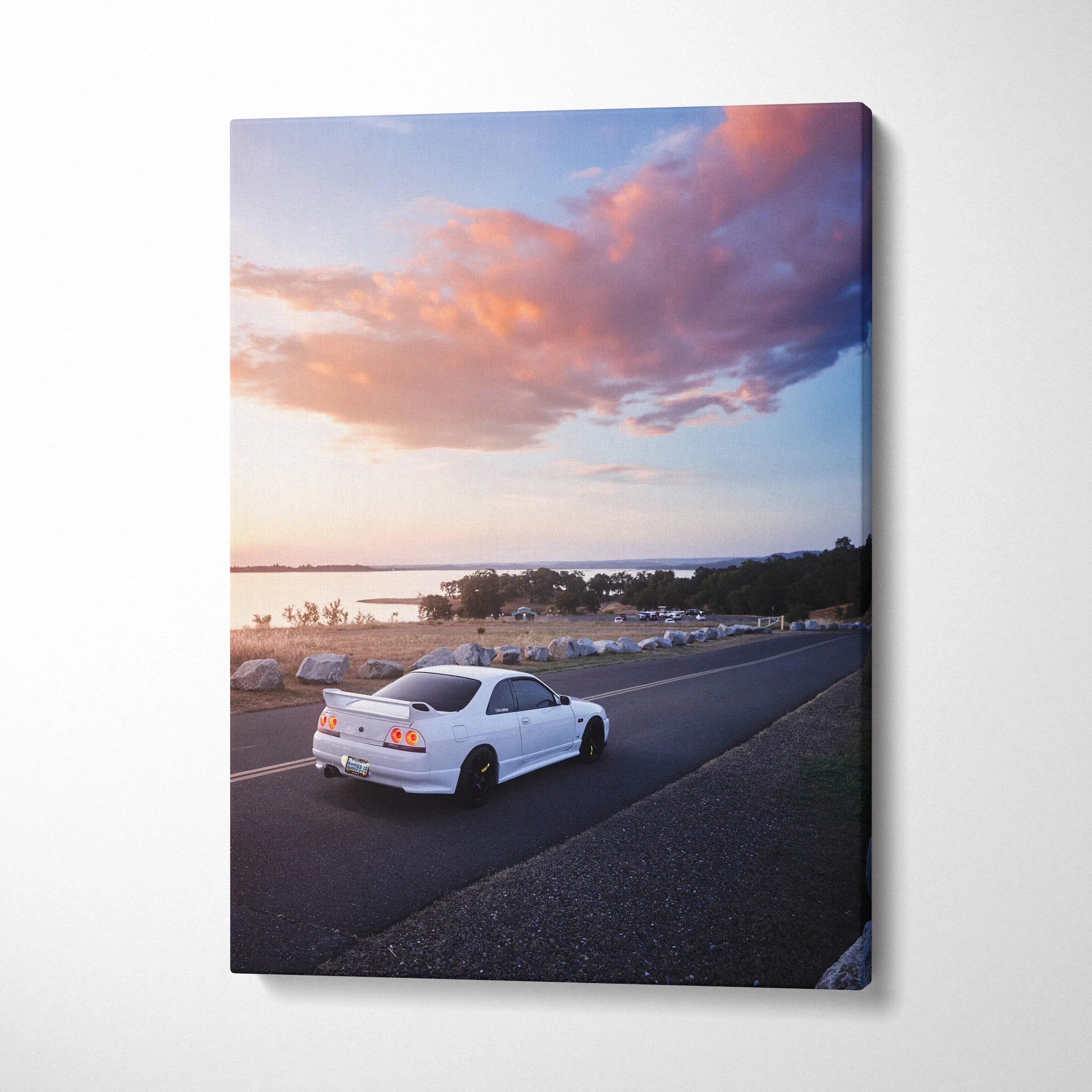 White Nissan R33 GTS-T on highway at sunset with colorful sky, vertical canvas wall art.