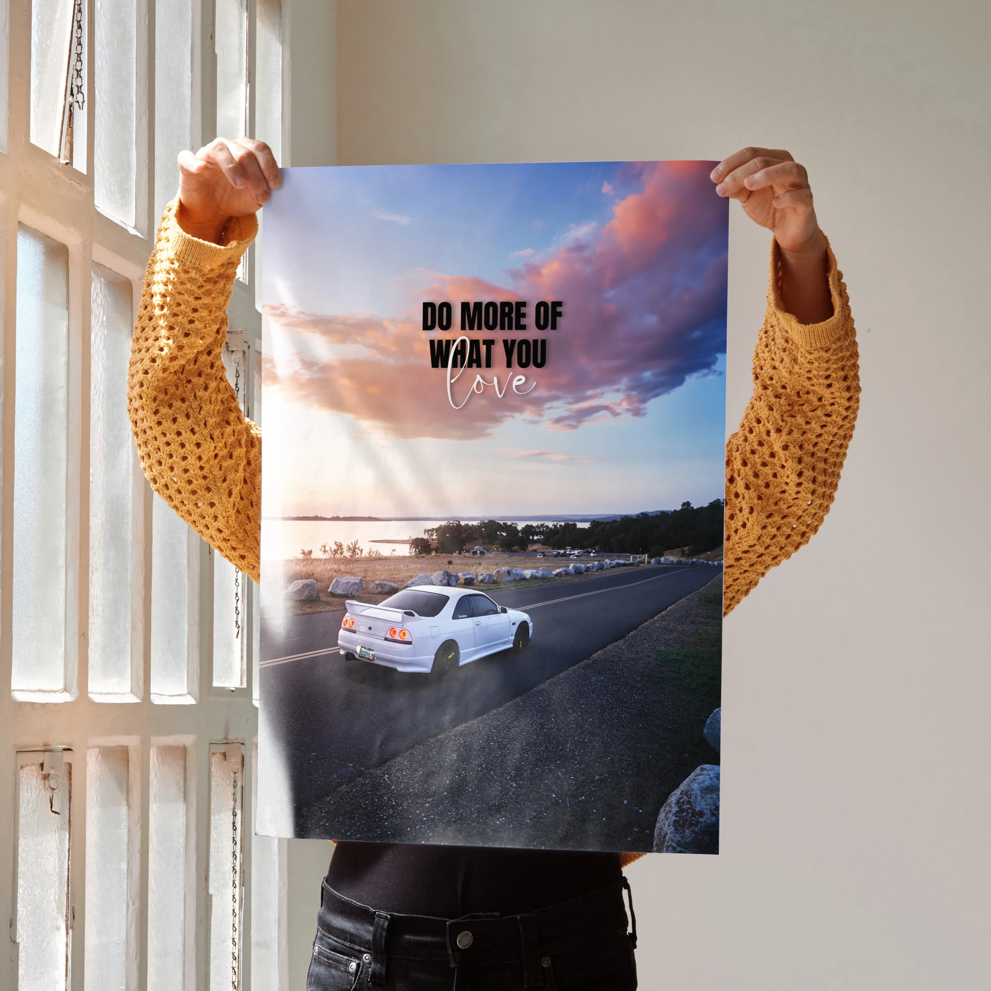 Motivational poster wall art featuring white Nissan R33 Skyline GTS-T on open road at sunset.