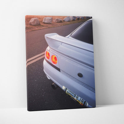 Nissan R33 GTS-T rear view close-up canvas art wall art with vibrant tail lights and road background.