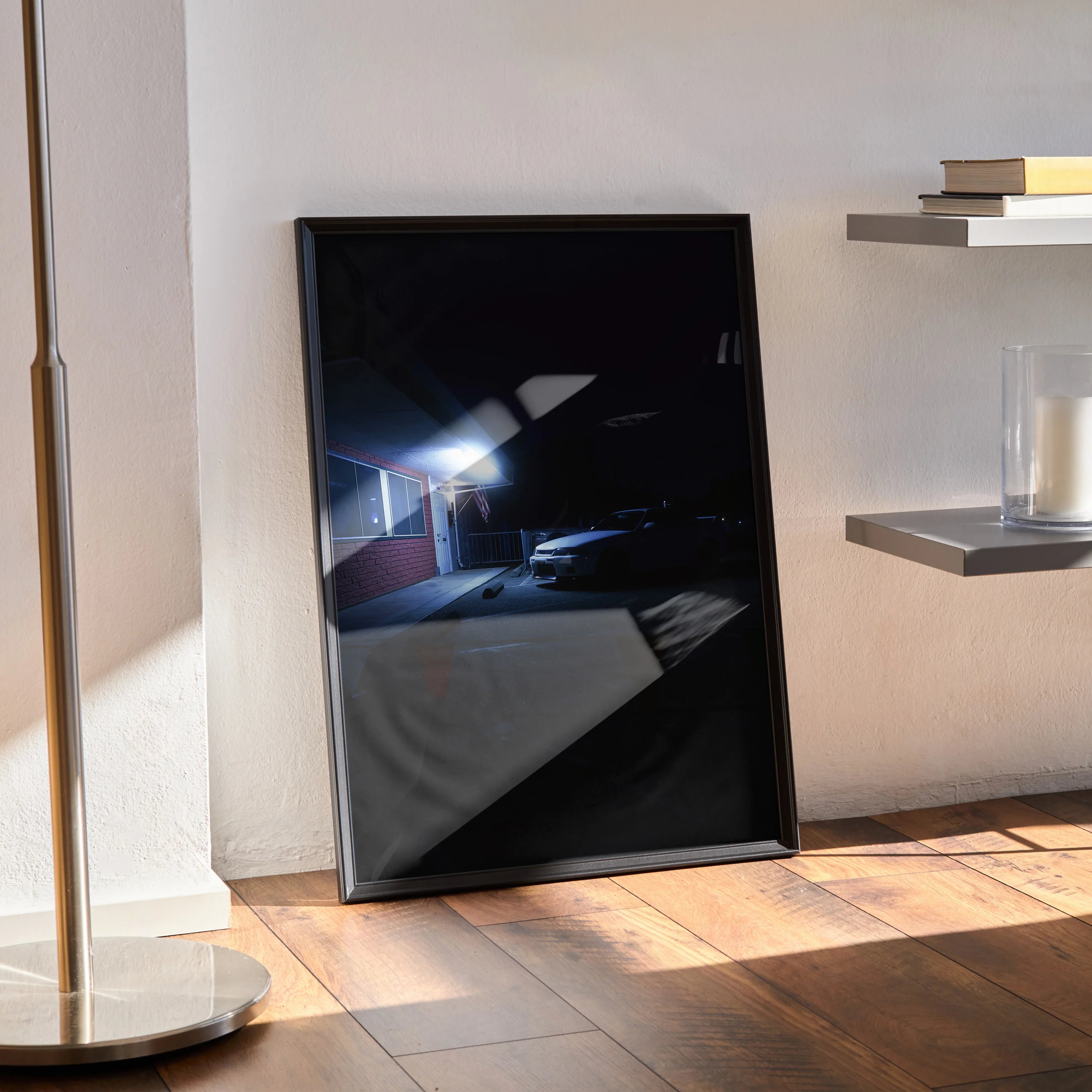 Nissan Skyline R33 GTS-T poster in sleek black frame leaning against wall, automotive wall art with dark, moody tones.