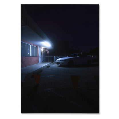 Nissan Skyline R33 GTS-T parked at night under bright wall light poster wall art.