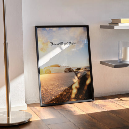 Motivational wall art poster featuring a white Nissan 370z on a sunlit road with inspiring text "You will get there".