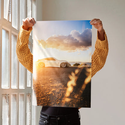 Nissan 370z poster showing car at sunset with warm lighting, wall art for car enthusiasts.