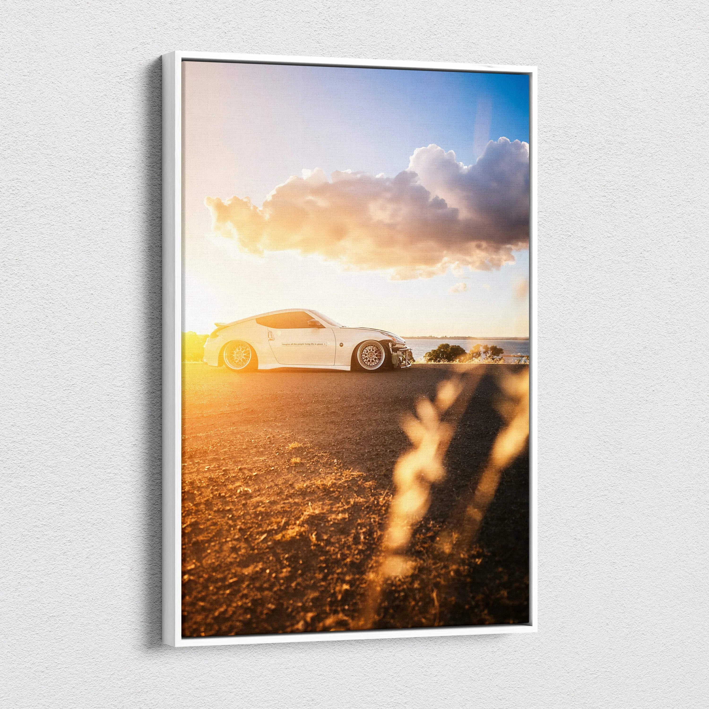 Nissan 370z on desert road at sunset canvas wall art with warm golden light and dramatic sky.