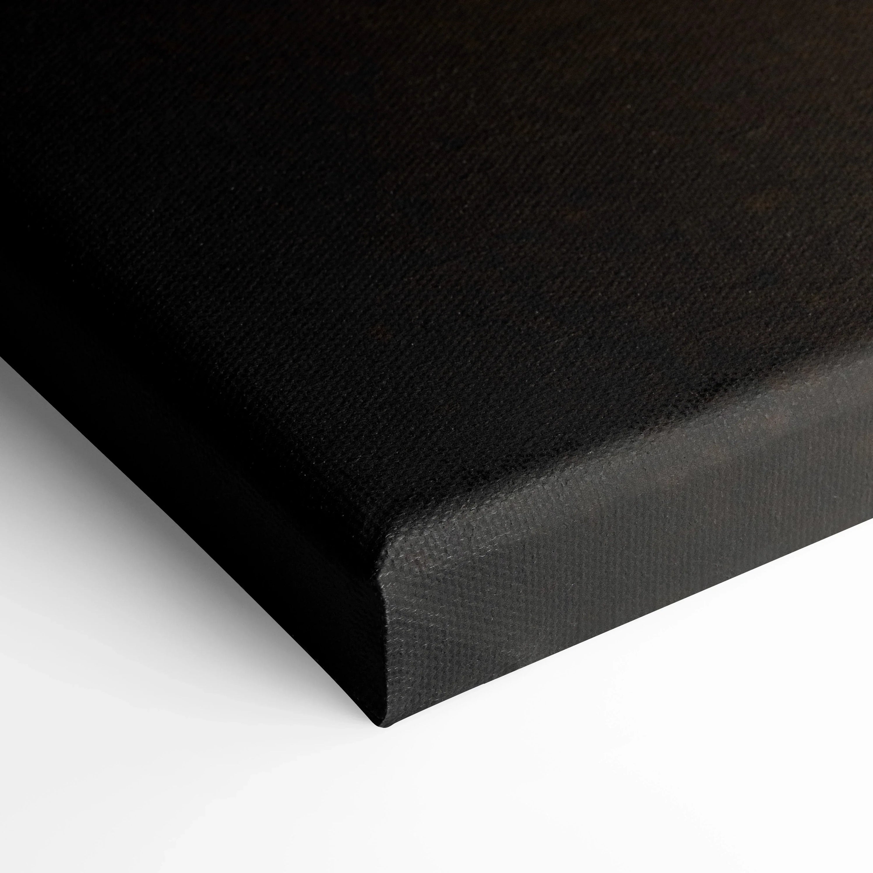 Black stretched canvas corner with textured weave, high-quality vertical canvas art print edge.