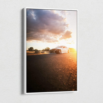 Sunset Nissan 370z on road with dramatic clouds vertical canvas wall art.