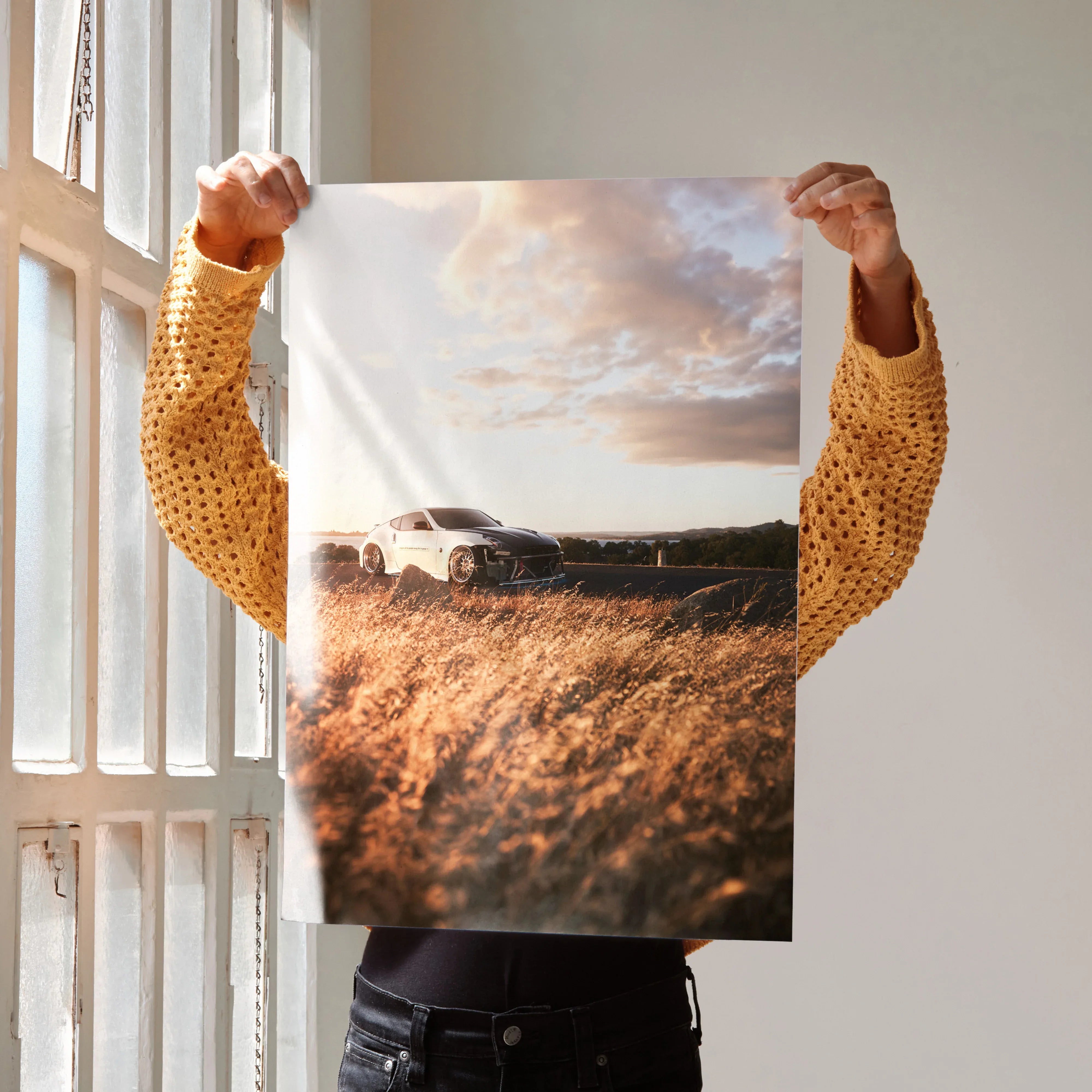 Nissan 370z poster showing white sports car in golden field at sunset wall art.