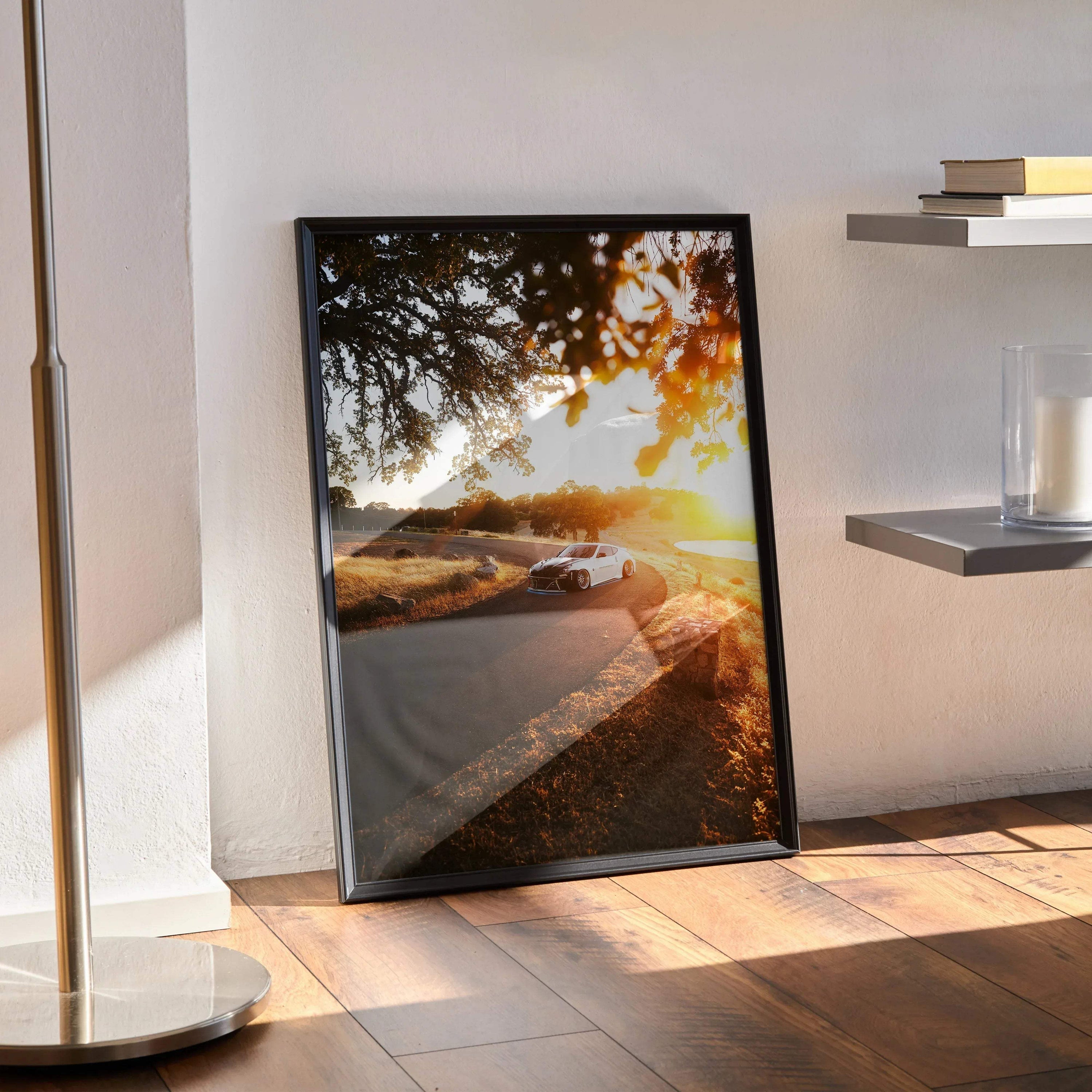 Nissan 370z poster with sunset road scene framed as modern wall art in warm tones.