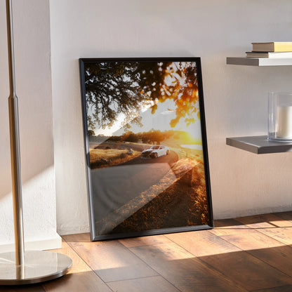 Nissan 370z poster with sunset road scene framed as modern wall art in warm tones.