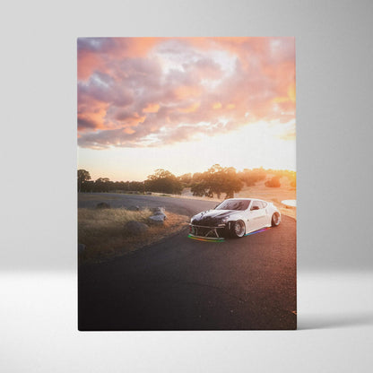 Nissan 370z racing on asphalt at sunset vertical canvas wall art print with vibrant sky colors.