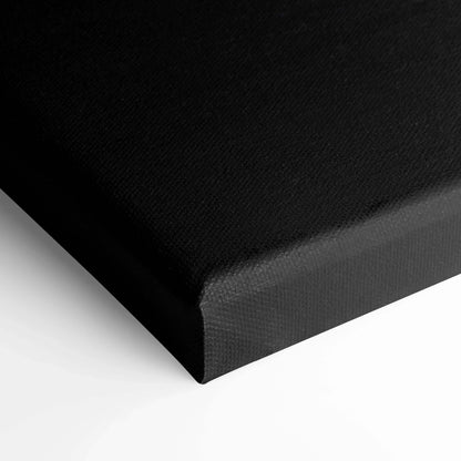 Black wrapped edge of vertical canvas wall art with fine textured finish.