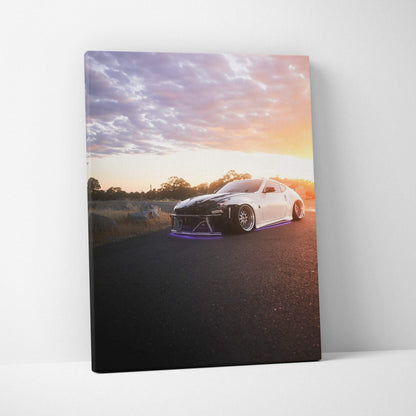 Nissan 370z at sunset on canvas wall art with vibrant sky and road background.
