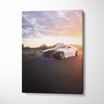 Nissan 370z at sunset on asphalt road canvas wall art with vibrant sky colors.