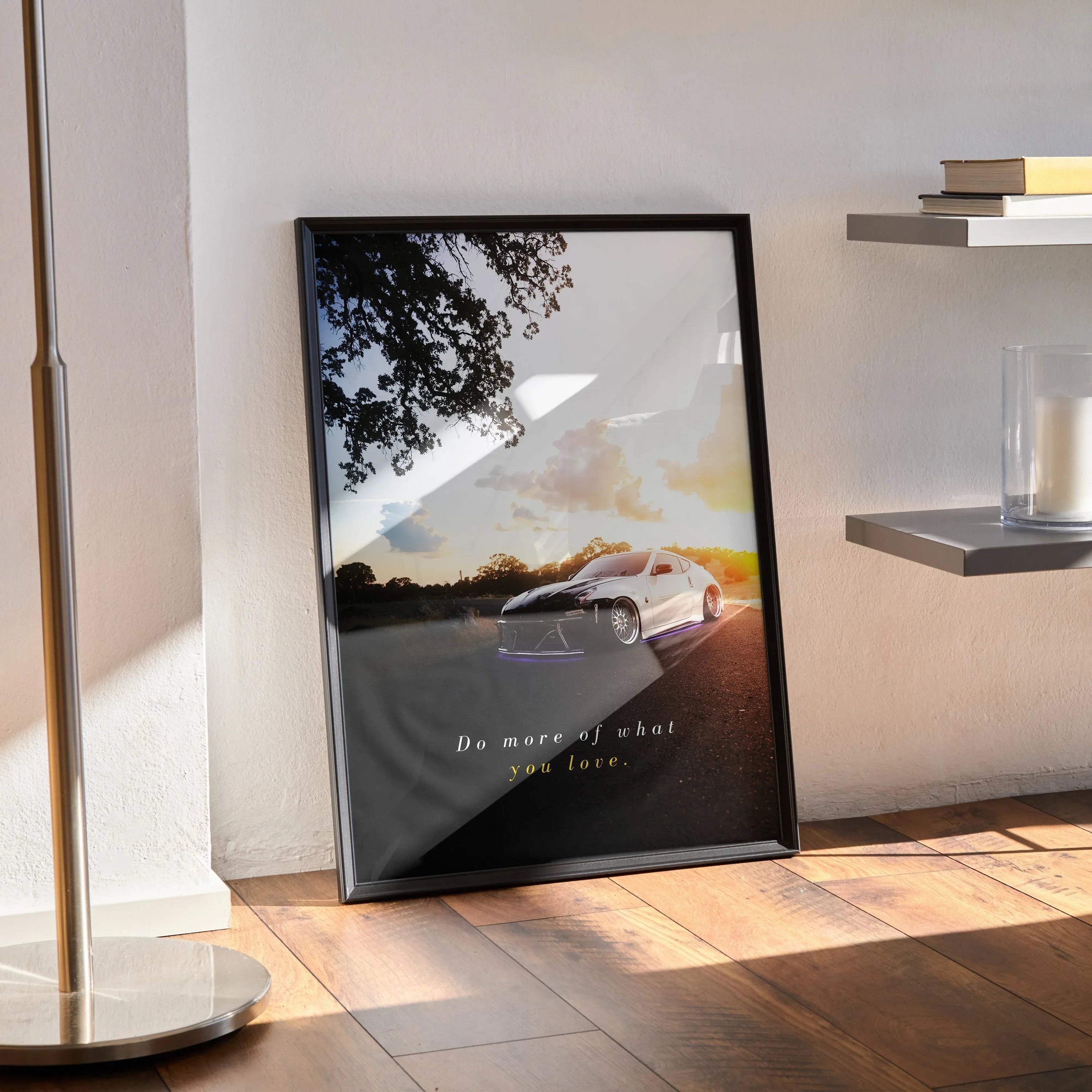 Motivational poster wall art featuring a white Nissan 370z on a sunset road with inspiring text.