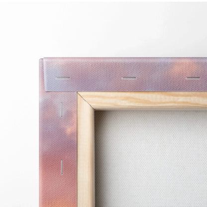 Close-up of wooden frame and stapled canvas back of vertical wall art print.