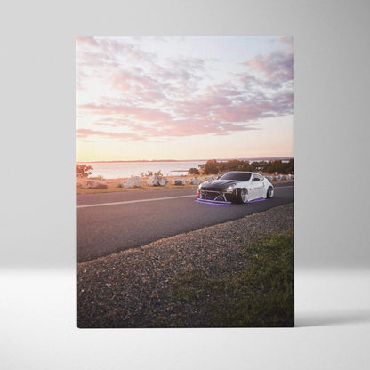 Nissan 370z parked on roadside at sunset vertical canvas art with soft sky background.
