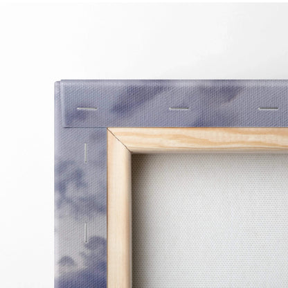 Close-up of wooden frame corner with stretched white canvas and gray printed edges for vertical wall art canvas print.
