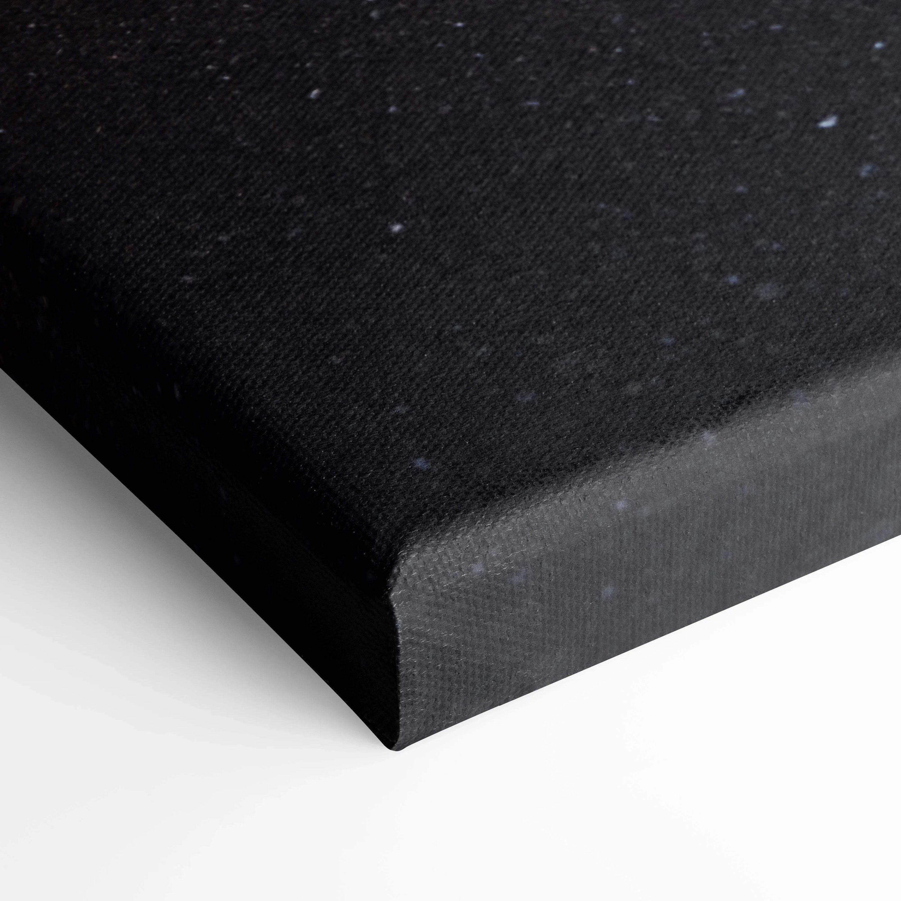 Black textured canvas corner with tight wrapped edges for high-quality wall art canvas print.