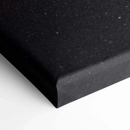 Black textured canvas corner with tight wrapped edges for high-quality wall art canvas print.