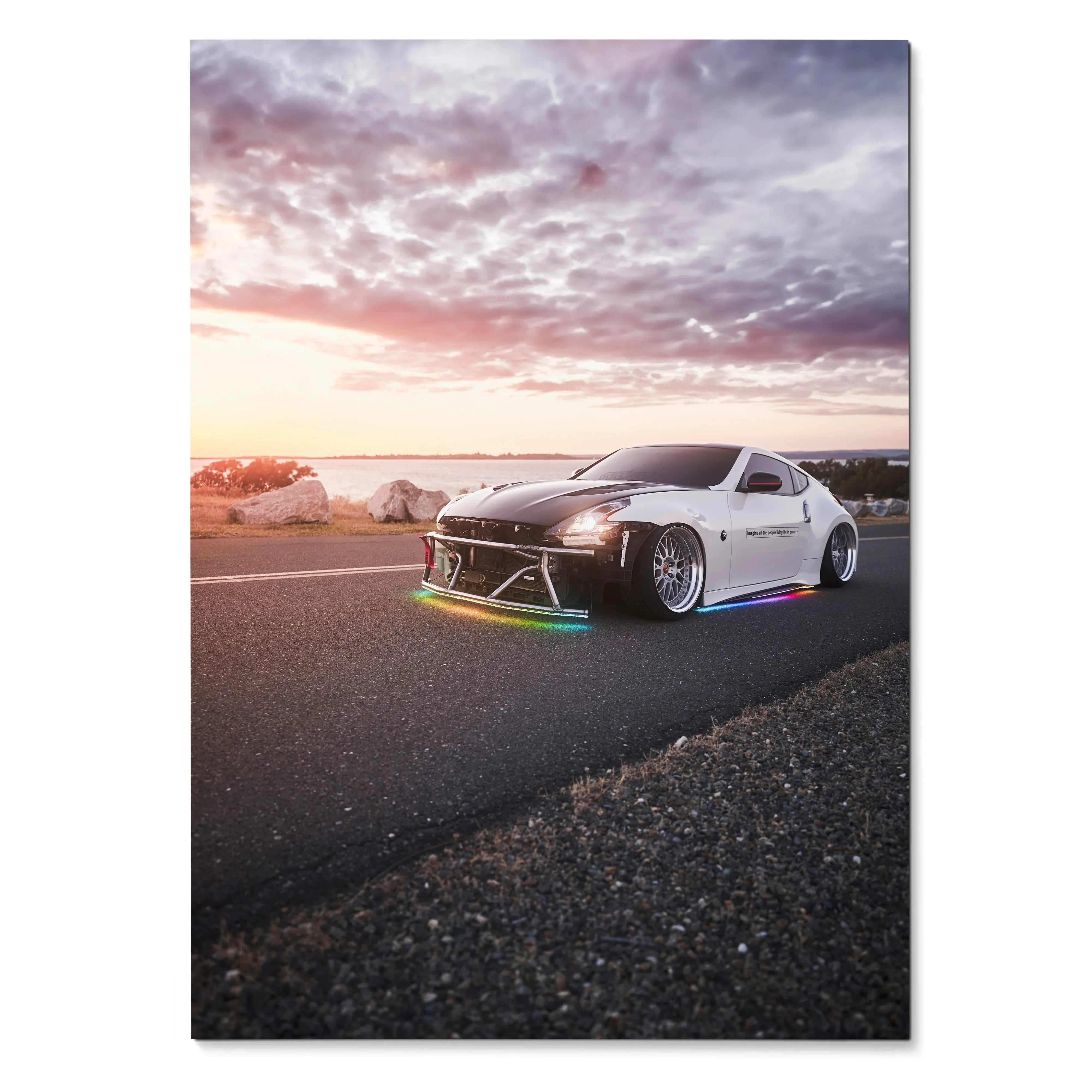 Nissan 370z parked on road at sunset with vibrant colorful underglow car poster wall art.