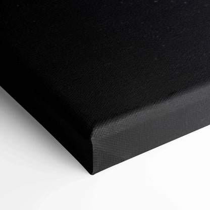 Black corner of a high-resolution Nissan 370z vertical canvas print with museum-quality texture, wall art detail.