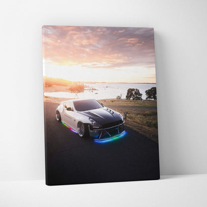 Vertical canvas art of a white Nissan 370z with neon lights on a road at sunset, high resolution wall art.